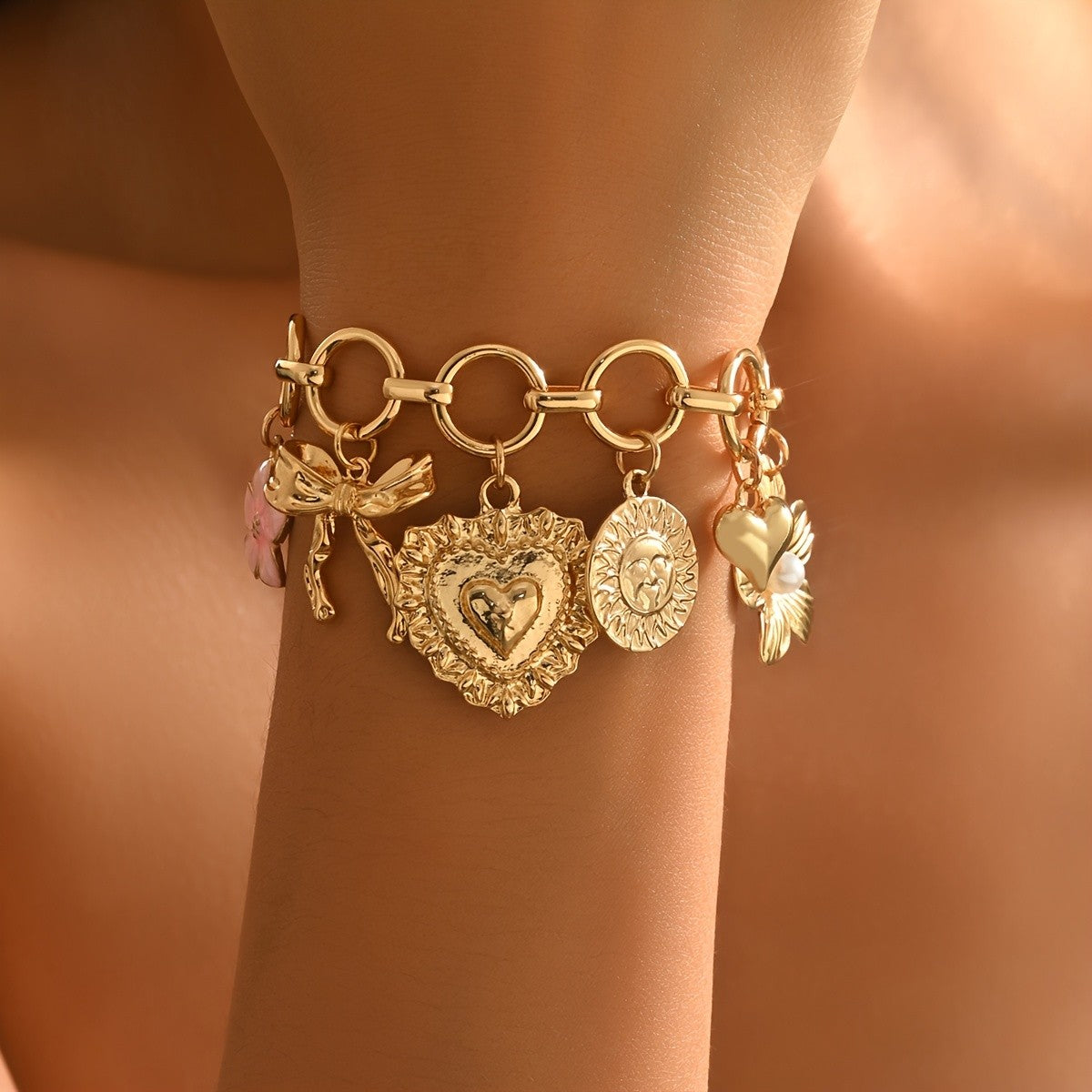 Gold Heart and Bow Charm Bracelet