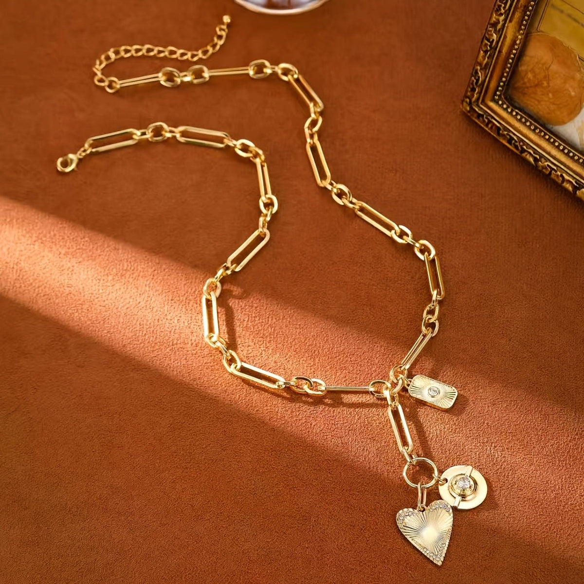 Gold Heart Sunburst Pendant Necklace