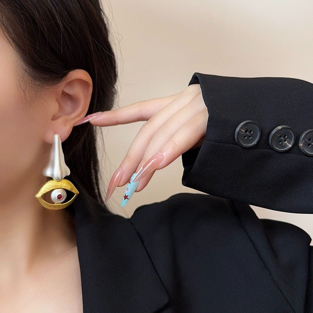 Asymmetric Nose and Eye Drop Earrings