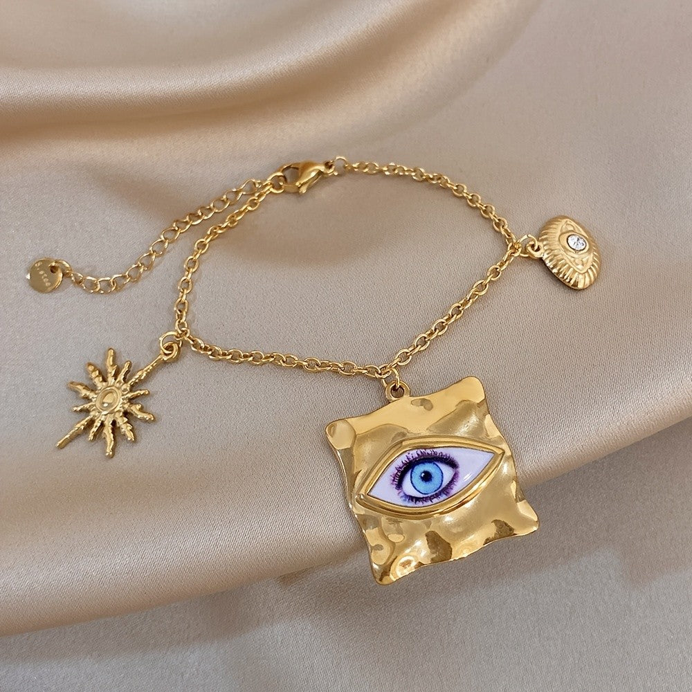 18k Eye Sun Charm Bracelet