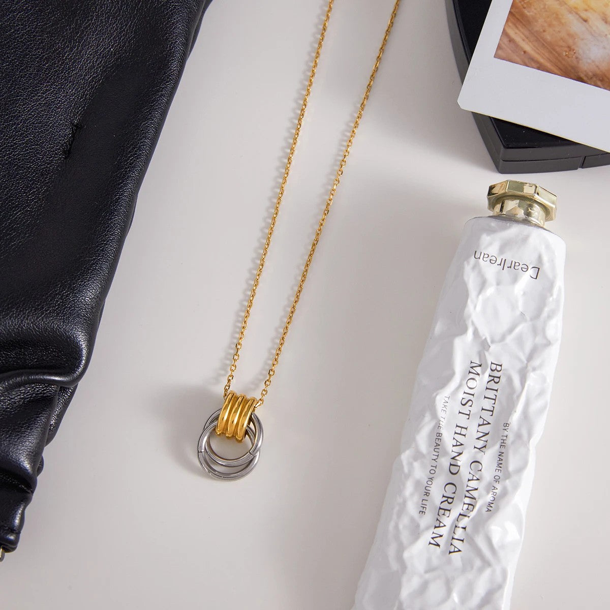 Two-Tone Interlocking Circle Pendant Necklace