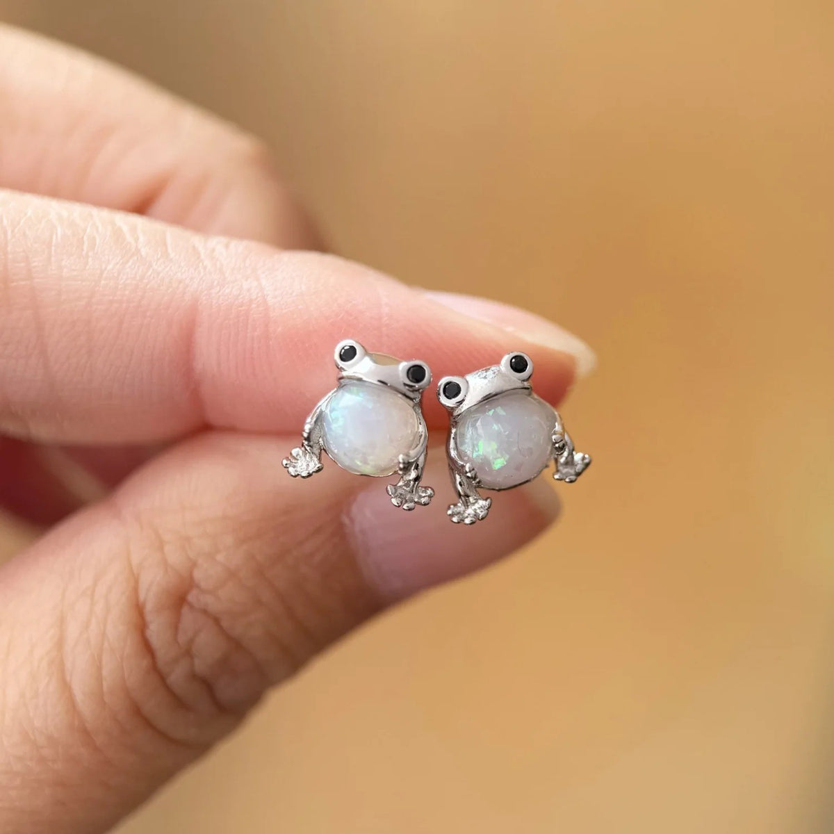 CK Penguin Opal Stud Earrings
