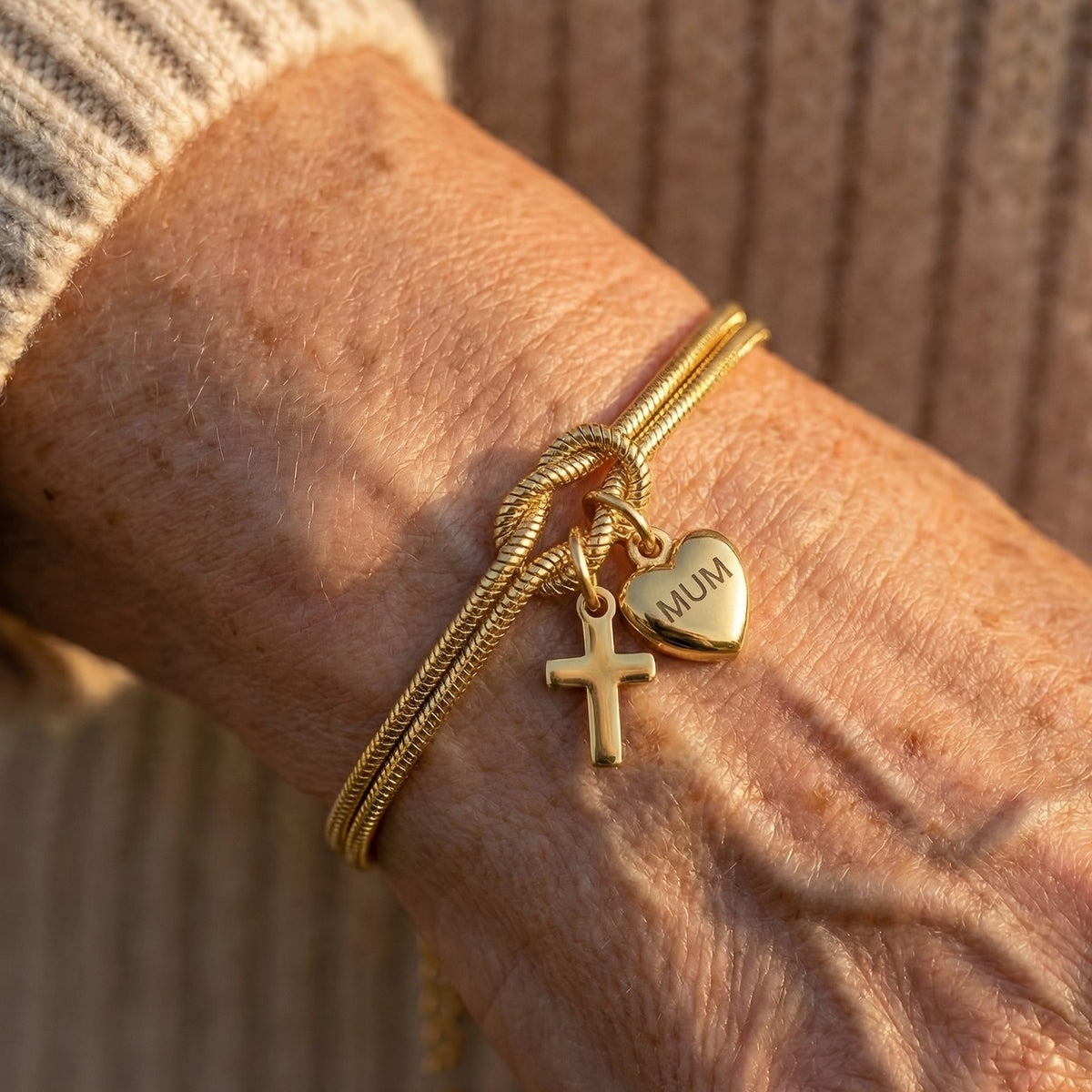 18k Heart Cross Charm Bracelet