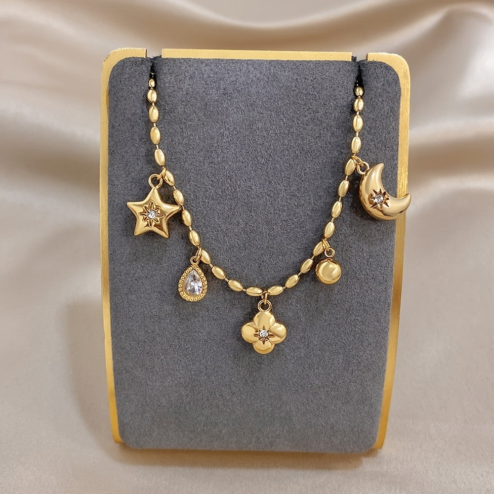 18k Charm Bracelet with Star and Flower Pendants