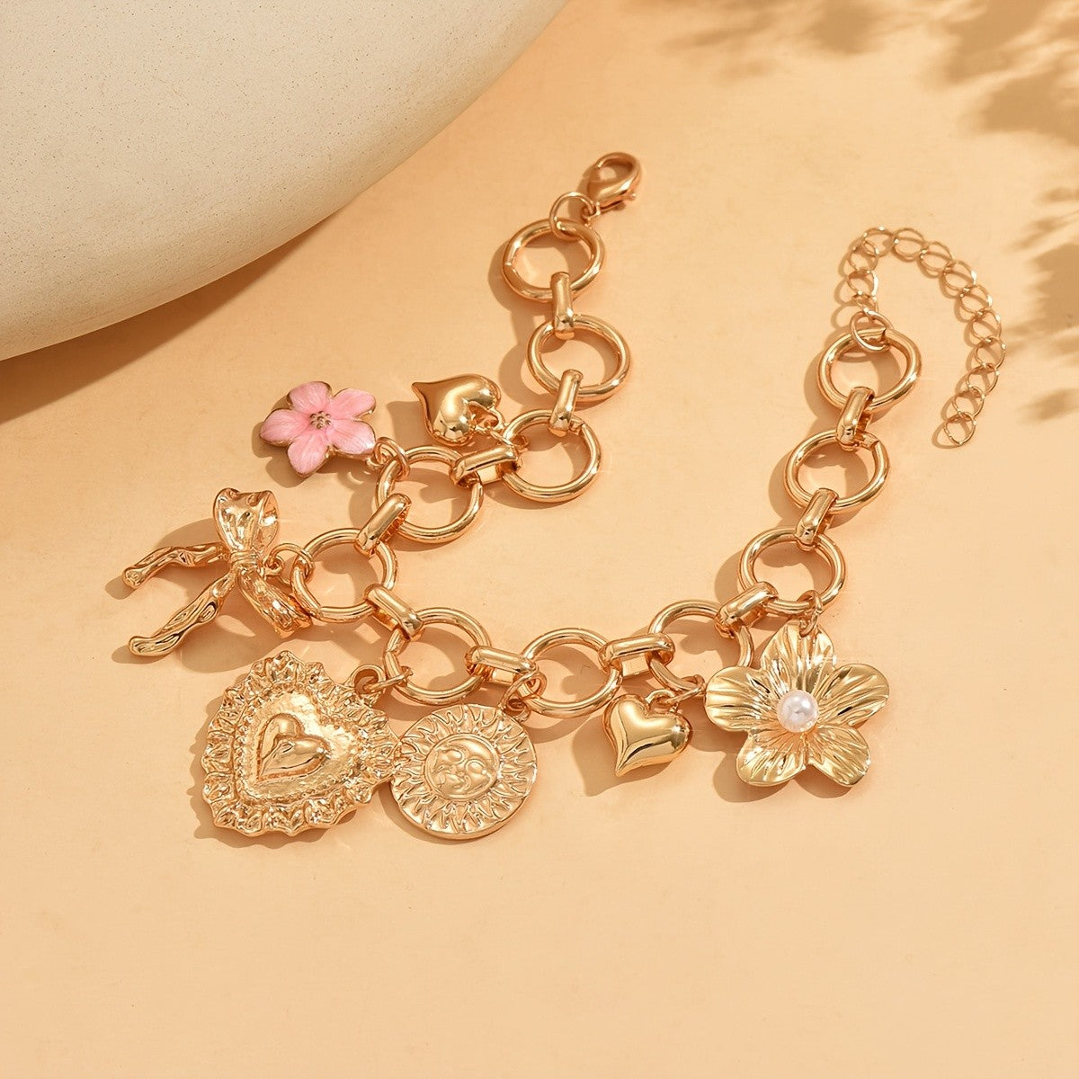 Gold Heart and Bow Charm Bracelet