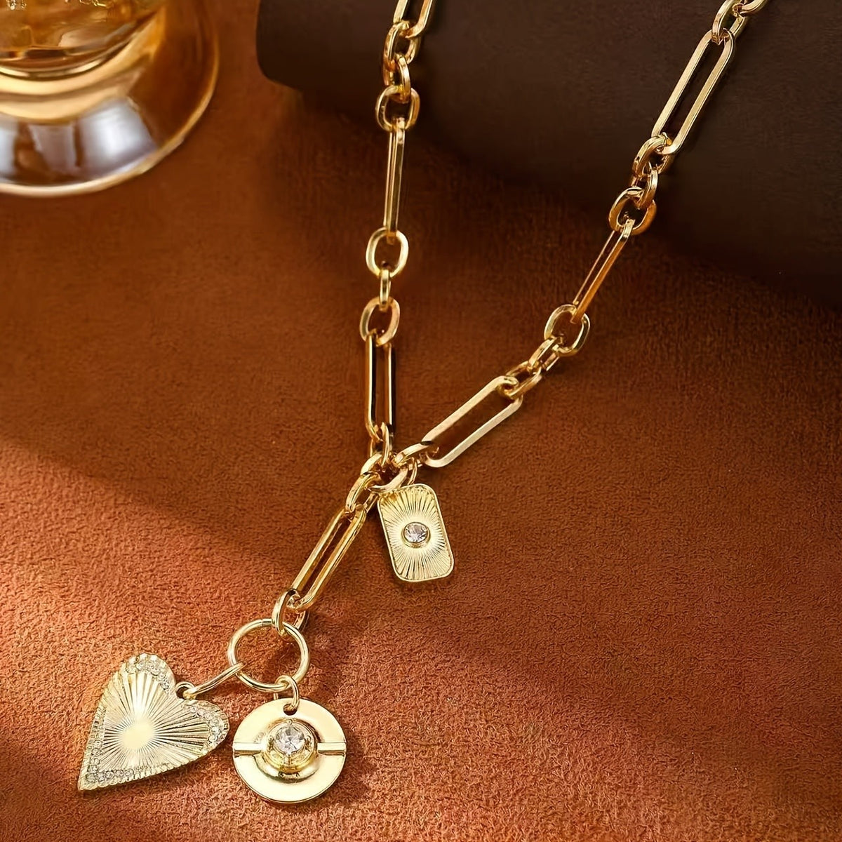 Gold Heart Sunburst Pendant Necklace