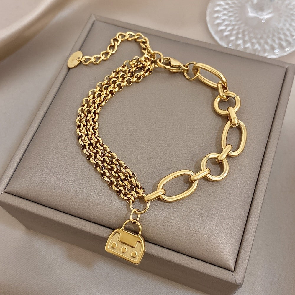 18k Mixed Chain Bracelet with Bag Charm