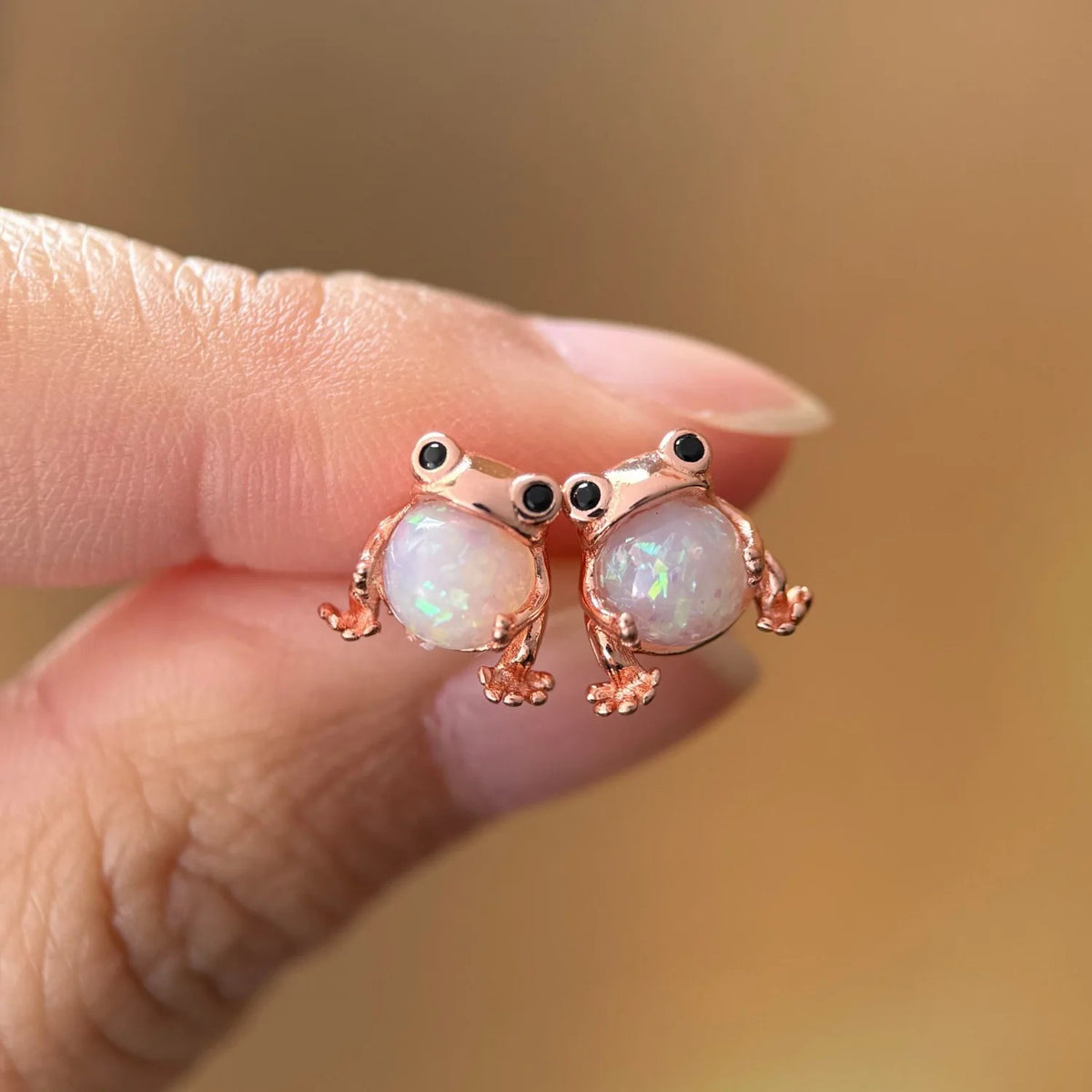 CK Penguin Opal Stud Earrings