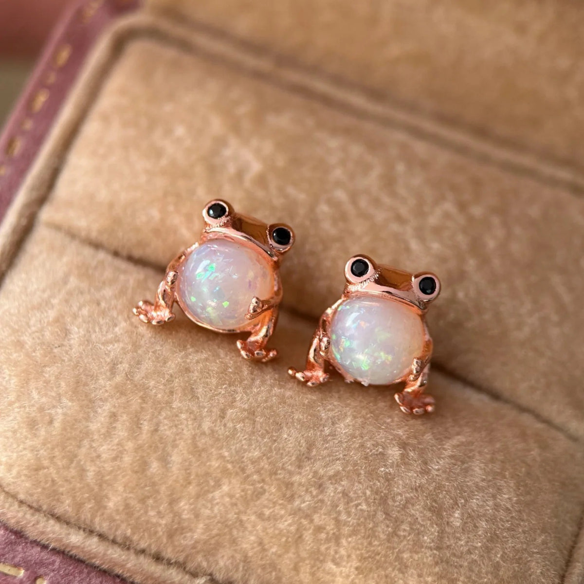 CK Penguin Opal Stud Earrings